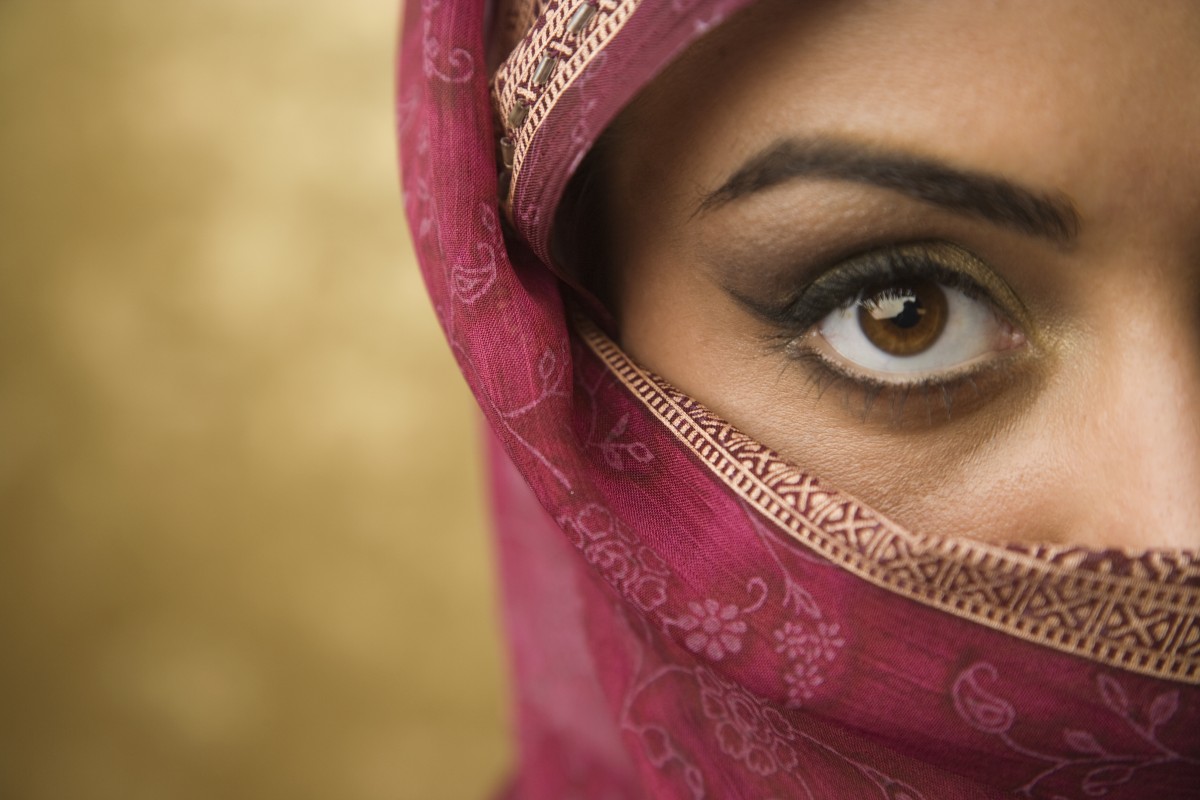 Mid East Woman in Hijab Striking